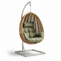 Hanging egg chair with cushion for outdoor and indoor use in green and wood finish